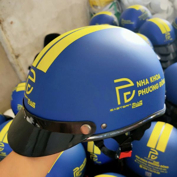 Báo giá và ưu đãi khi đặt mũ bảo hiểm in logo làm quà Tết