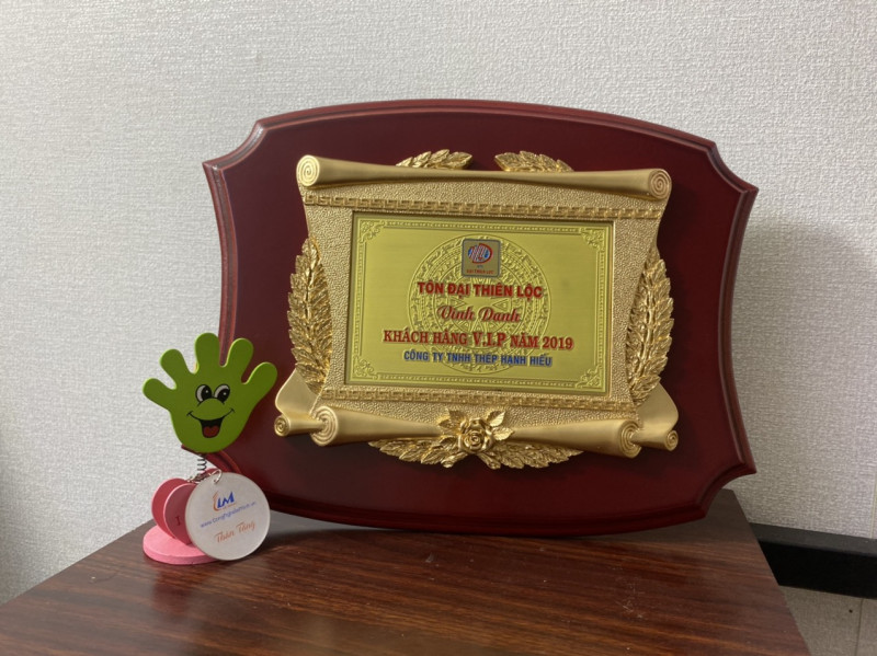 Kỷ niệm chương gỗ đồng là gì